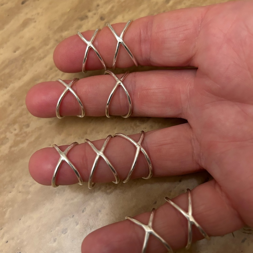 Elegant Silver X-Design Ring (the buyer receives 1 ring) sizes 4-10